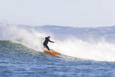 Dane Robertson tears a wave up on a fun autumn day at Blackhead, Dunedin, New Zealand.Photo: Derek Morrison