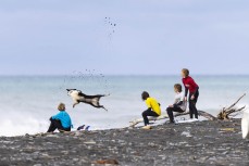 Surfers prepare for a heat during the 2022 O'Neill Kaikoura Cold Water Classic held at a surf break near Kaikoura, New Zealand. Photo: Derek Morrison