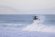Nick Hanover making the most of a fun swell at a break along the South Coast, Dunedin, New Zealand.Photo: Derek Morrison