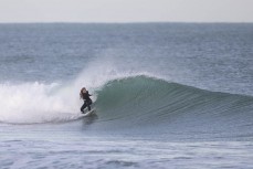 Rewa Morrison during a fun swell at a break along the South Coast, Dunedin, New Zealand.Photo: Derek Morrison