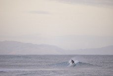 Nick Hanover making the most of a fun swell at a break along the South Coast, Dunedin, New Zealand.Photo: Derek Morrison