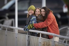 Mates keeping warm in winter at St Clair, Dunedin, New Zealand.
Photo: Derek Morrison