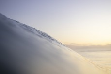 Late afternoon light on a wave during an evening session in winter at Blackhead, Dunedin, New Zealand.Credit: Derek Morrison