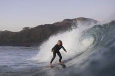 Keo Morrison hunting barrels during a fun evening session in winter at Blackhead, Dunedin, New Zealand.Credit: Derek Morrison