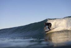Dane Robertson during a fun evening session in winter at Blackhead, Dunedin, New Zealand.Credit: Derek Morrison