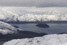 Fresh snow in mountains across Lake Wanaka , Central Otago, New Zealand.