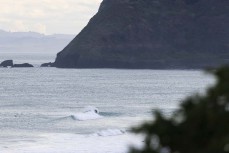 A surfer finds a cheeky little bank near St Kilda, Dunedin, New Zealand.Credit: Derek Morrison