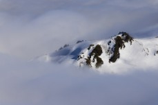 Above the clouds at Cardrona ski field, Cardrona Valley, Wanaka, New Zealand.