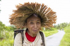 An elderly villager returns from a day of work, Malakopi, Mentawais Island chain, Western Sumatra, Indonesia.