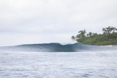 Lone peak during a September swell near Thunders  in the Mentawais Island chain, Western Sumatra, Indonesia.