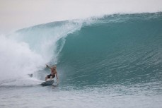 Bones on a runner during a September swell at Lance's Lefts in the Mentawais Island chain, Western Sumatra, Indonesia.