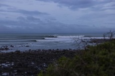 The lineup at dawn ahead of the 2022 New Zealand Scholastics Surfing Champioships held at a pointbreak near New Plymouth, Taranaki, New Zealand.