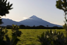 Mount Taranaki and farmland, New Plymouth, Taranaki, New Zealand.