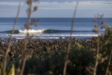 A clean glassy wave near New Plymouth, Taranaki, New Zealand.