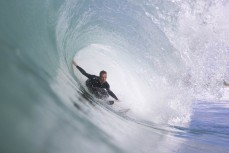 Caleb Cutmore gets barelled during a Backdoor surf trip in the South Island, New Zealand. Photo: Derek Morrison