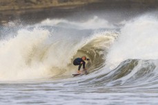 Keo Morrison makes the most of a playful swell in the Catlins, Southland, New Zealand.Credit: Derek Morrison