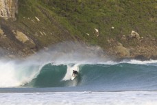 Davy Wooffindin during a playful swell in the Catlins, Southland, New Zealand.Credit: Derek Morrison