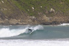 Max Wooffindin during a playful swell in the Catlins, Southland, New Zealand.Credit: Derek Morrison