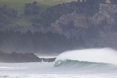 No takers during a northeast swell at a remote pointbreak near Dunedin, New Zealand.Credit: Derek Morrison