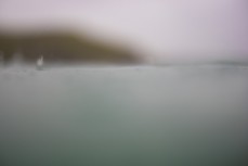 during a northeast swell at a remote pointbreak near Dunedin, New Zealand.
Credit: Derek Morrison