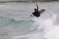 Jack Tyro during a northeast swell at a remote pointbreak near Dunedin, New Zealand.Credit: Derek Morrison