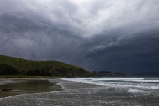 Weather during a northeast swell at a remote pointbreak near Dunedin, New Zealand.Credit: Derek Morrison