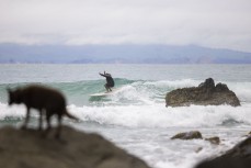 Homa Mattingly during a northeast swell at a remote pointbreak near Dunedin, New Zealand.Credit: Derek Morrison