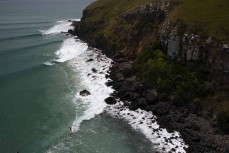 A northeast swell at a remote pointbreak near Dunedin, New Zealand.Credit: Derek Morrison