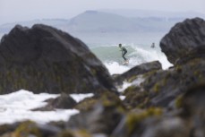 Dino Walton through the rocks during a summer swell on the North Coast, Dunedin, New Zealand.
Credit: Derek Morrison