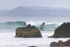 Lewis Murphy and dad Luke during a summer swell on the North Coast, Dunedin, New Zealand.
Credit: Derek Morrison