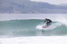 Jane Gabbott during a summer swell on the North Coast, Dunedin, New Zealand.
Credit: Derek Morrison