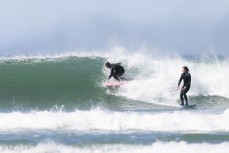 Mates share a wave during a small summer swell at Blackhead, Dunedin, New Zealand.
Credit: Derek Morrison