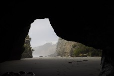 Through the cave at Doctor's Point, Blueskin Bay, Dunedin, New Zealand.