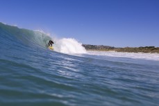 Nixon Reardon gets barrelled during a summer morning at St Kilda, Dunedin, New Zealand.
Credit: Derek Morrison