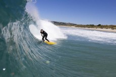 Nixon Reardon lines up a barrel during a summer morning at St Kilda, Dunedin, New Zealand.
Credit: Derek Morrison