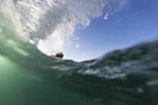 A surfer rides a wave during a warm summer evening at Blackhead, Dunedin, New Zealand.
Credit: Derek Morrison