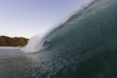 Pete Malone gets tubed during a warm summer evening at Blackhead, Dunedin, New Zealand.
Credit: Derek Morrison