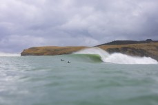 A quality lineup during a swell produced by Cyclone Gabrielle on the north coast of Dunedin, New Zealand.