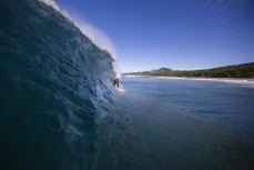 A surfer gets barreled during a fun autumn swell at Blackhead, Dunedin, New Zealand.Credit: Derek Morrison