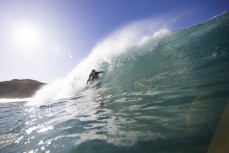 Jordan Sparrow gets barreled during a fun autumn swell at Blackhead, Dunedin, New Zealand.Credit: Derek Morrison