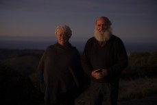 Ann and Bo Bateman watch the sunrise at Kapukataumahaka (Mt Cargill), Dunedin, New Zealand.Credit: Derek Morrison