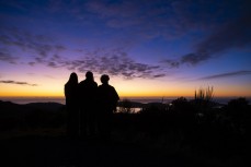 Ann and Bo Bateman, and Taya Morrison watch the sunrise at Kapukataumahaka (Mt Cargill), Dunedin, New Zealand.
Credit: Derek Morrison