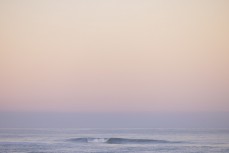 Lone peak at Middle Beach on dusk, Dunedin, New Zealand.Credit: Derek Morrison