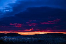Sunrise over  the Otago Harbour and South Dunedin, New Zealand.
Photo: Derek Morrison