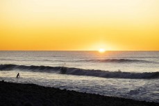  Dawn breaks during the 2023 O'Neill Coldwater Classic held at a surf break near Kaikoura, New Zealand. Photo: Derek Morrison