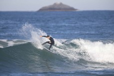 A surfer makes the most of a swell at St Kilda, Dunedin, New Zealand.Photo: Derek Morrison