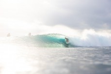 Zai Brown gets tubed at Lacerations surf break at Nusa Lembongan, Indonesia.