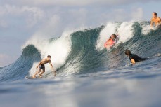 Typical set wave crowds at Peaks at Uluwatu, Bali, Indonesia.