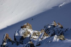 Eman and Marlee Silva drop into a fresh bowl at Ohau ski field, Ohau, Otago, New Zealand.