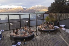 Packed hot tubs after a day of powder at Ohau ski field, Ohau, Otago, New Zealand.